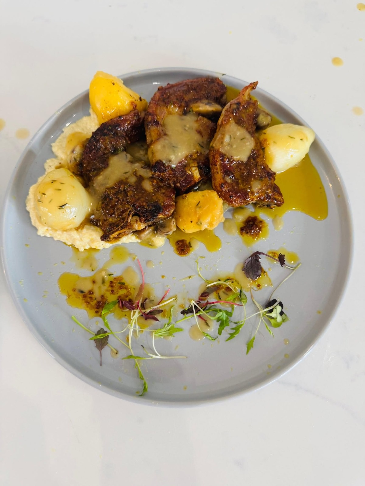 Chef-plated chicken dish with silky purée