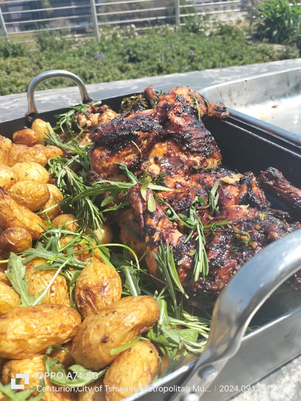 Flame-grilled braai meat with roasted potatoes