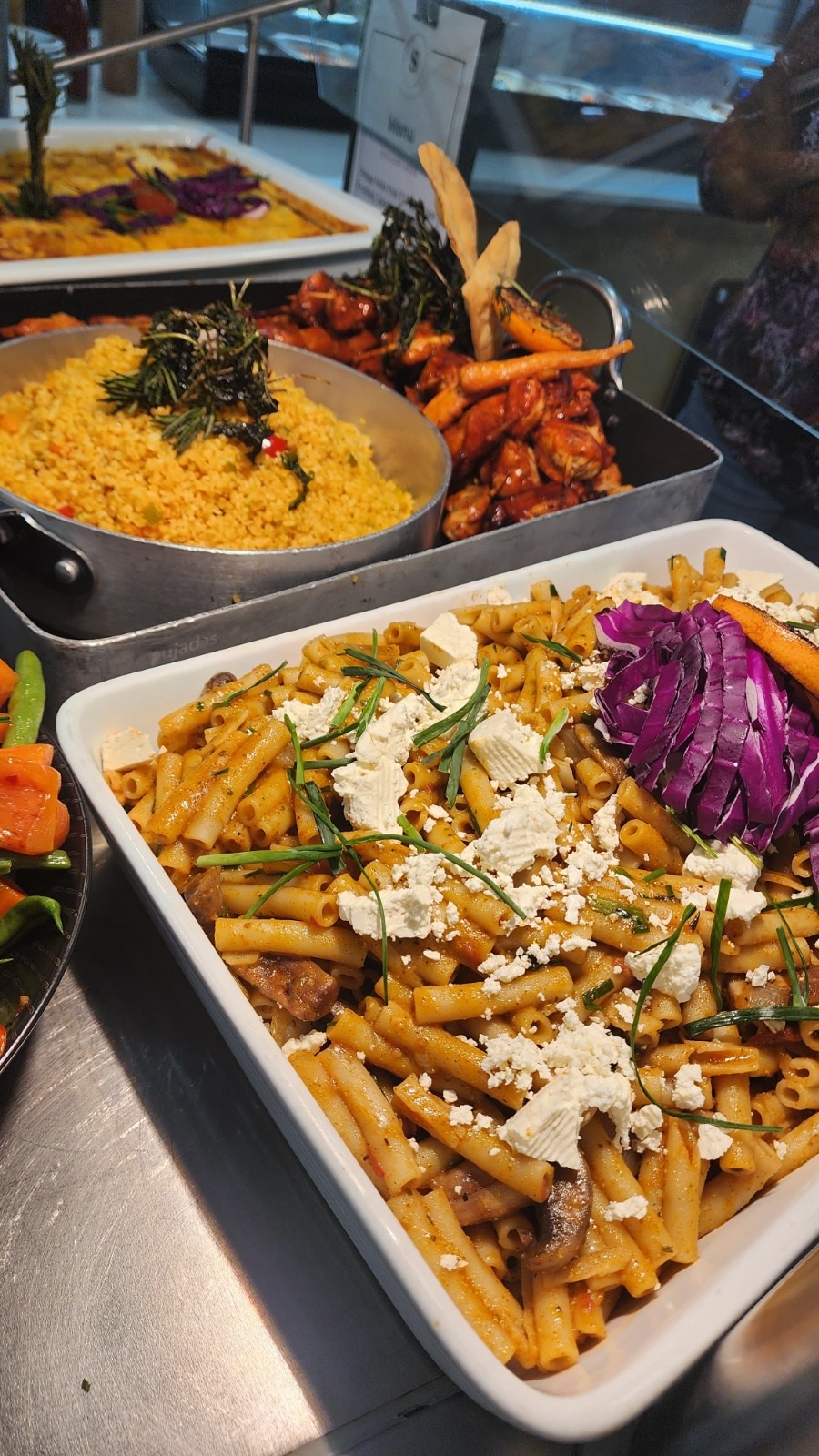 Buffet selection with chicken, couscous and salads